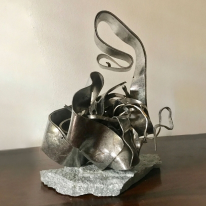 <b>Beauty begins the moment you decide to be yourself</b>, 2019.</br>
Recycled stainless steel, Luserna stown. 23 x 36 x 19 cm.