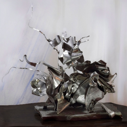 <b>Plica ex plica</b>, 2016.</br> Recycled stainless steel, Luserna stone. 
47 x 57 x 33 cm.